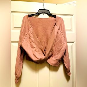 Beautiful light pink top. Can be worn both ( front and back).size M
